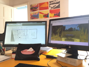 My desk at the office where I am getting drawings done for a house renovation project we call Colina which we will go see later. Yellow tiles on the right of the screen are for a terrace. The Lips are gobbling up the preservationist’s business card.