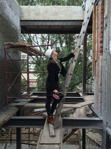 Going up! Checking out the rooftop of Colina, a house in the suburbs of Mexico City. This is a remodel and a central part of the project is to open a space to allow the light to come in, creating a big interior well at the bottom. This where I am standing on a ladder.